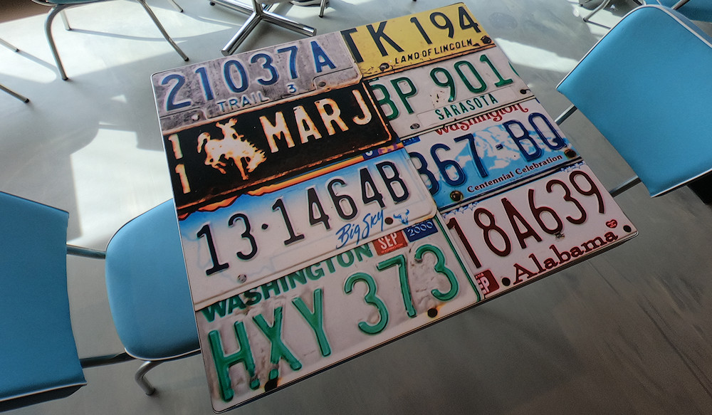 license plates on the tables at the American Diner on Norwegian Joy