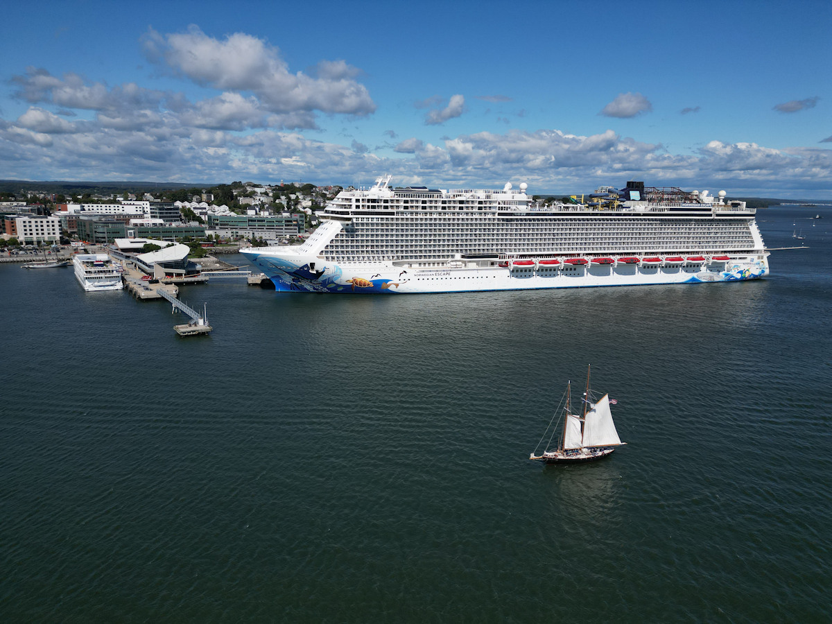 American Eagle docked next to Norwegian Escape