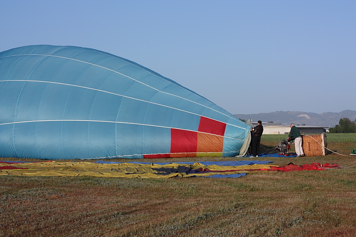 balloon is partially inflated prior to firing burners