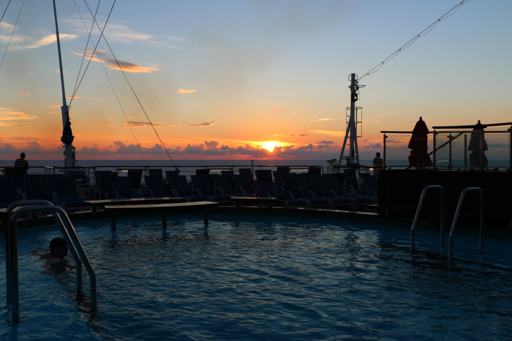Carnival Breeze aft pool at sunset