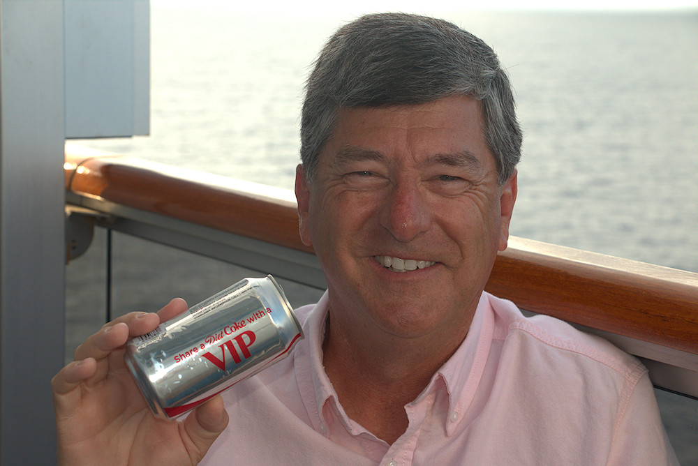 A 2015 photo of me on Carnival Breeze with a Diet Coke