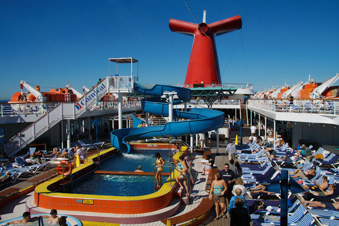 A photo of the pool area on the deck of the Carnival Elation