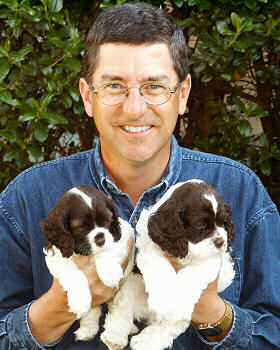 Jim with Cocker Spaniel puppies