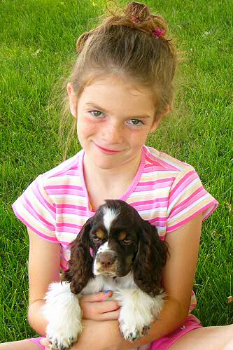 Our grand-niece and our Cocker Spaniel puppy