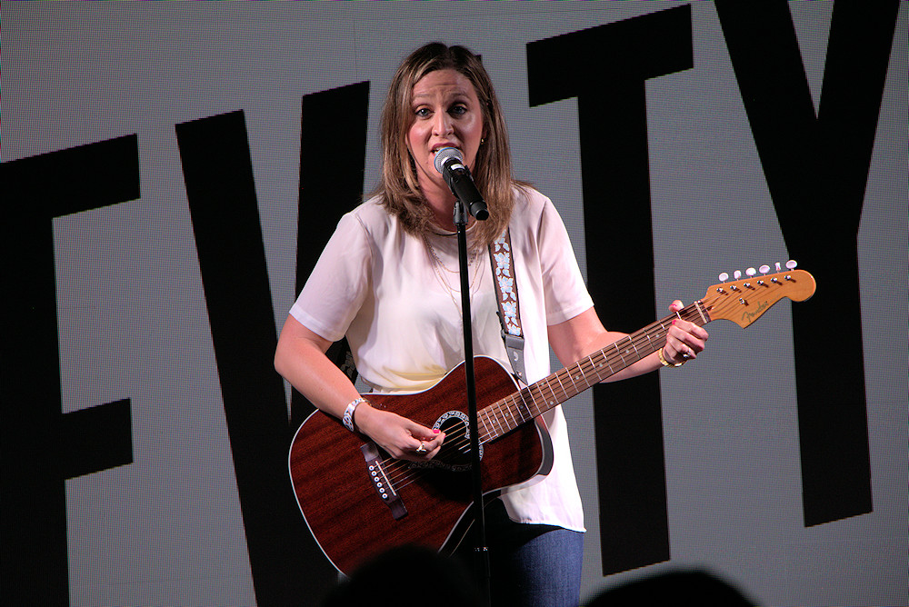 Comedian Allison Weber performing on Norwegian Bliss