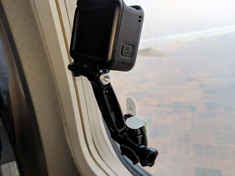 GoPro mounted on airliner window